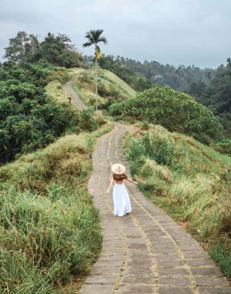 Woman walk on Campuhan Ridge Walk at Ubud Bali - Indonesia