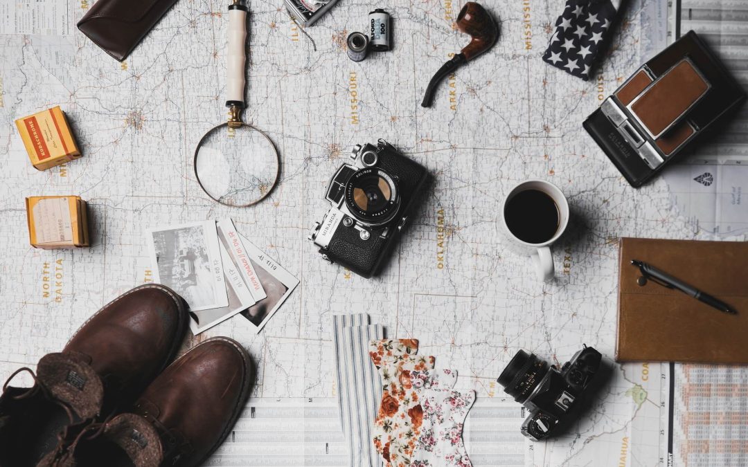 a map with a camera and a magnifying glass